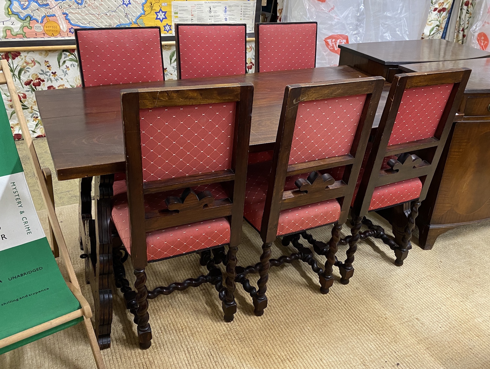 A Spanish style walnut rectangular refectory table, length 168cm, depth 84cm, height 78cm and six matching chairs